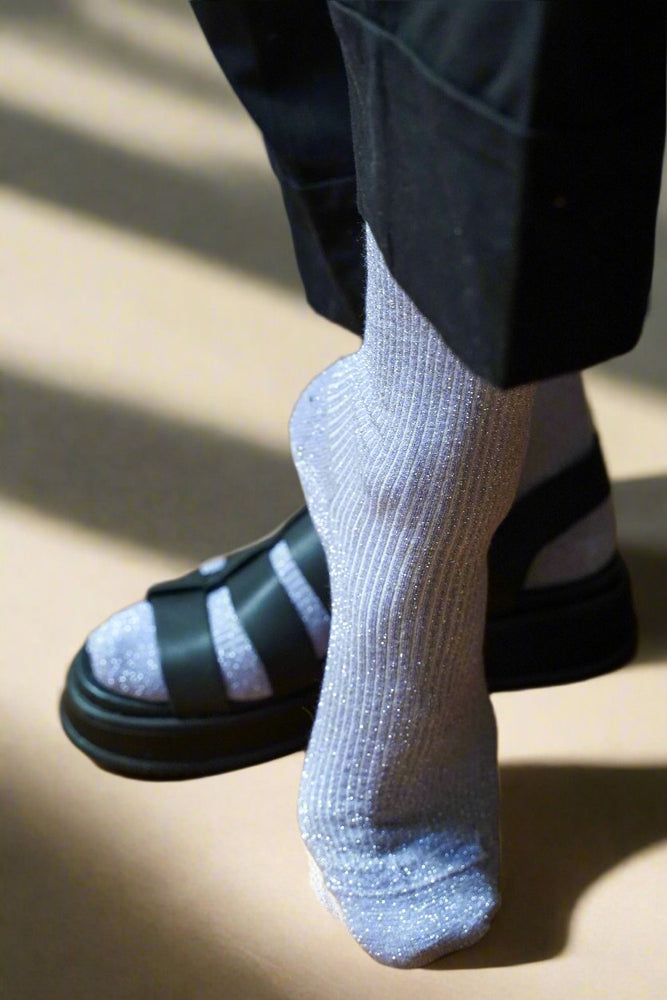 
                  
                    Lila Glitzernde Lurex Lyocell Socken
                  
                