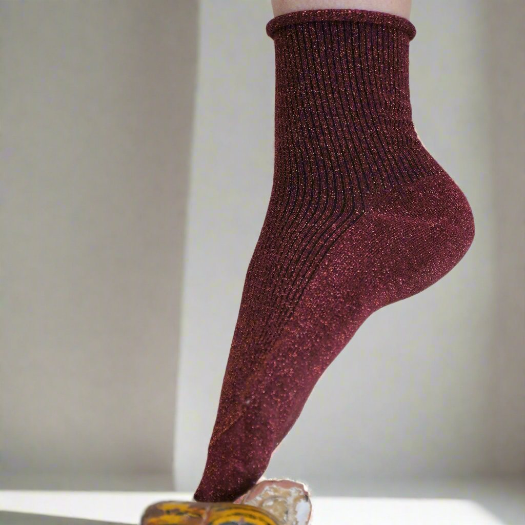 
                  
                    Rote Glitzersocken aus Lurex-Lyocell
                  
                