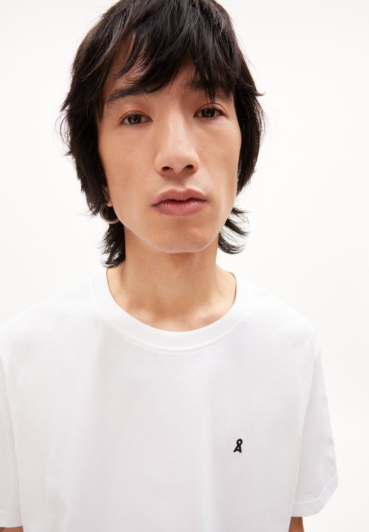 
                  
                    LAARON White T-Shirt
                  
                