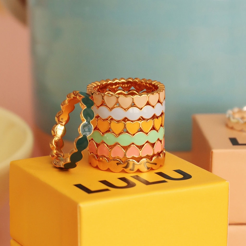 
                  
                    Burnt Coral Connected Hearts Ring
                  
                