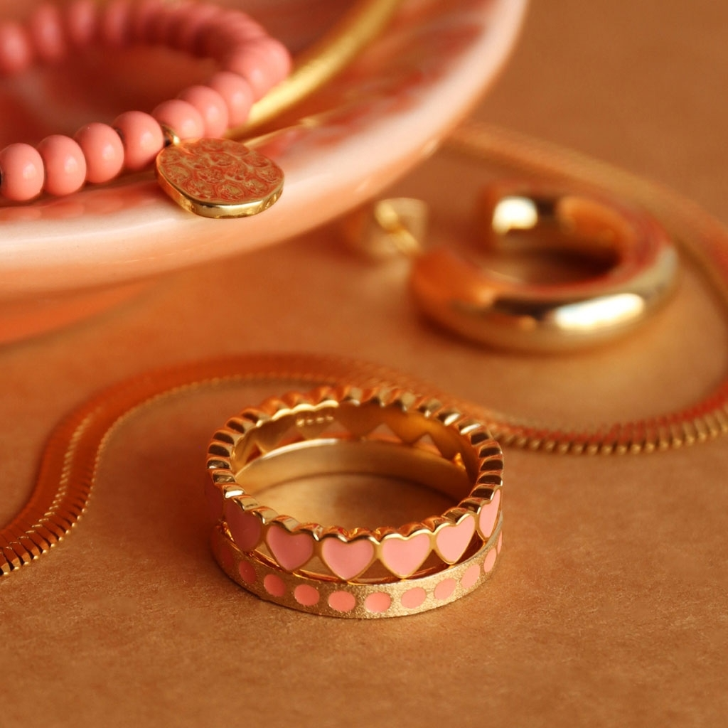 
                  
                    Burnt Coral Connected Hearts Ring
                  
                