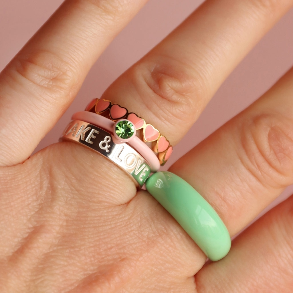 
                  
                    Burnt Coral Connected Hearts Ring
                  
                