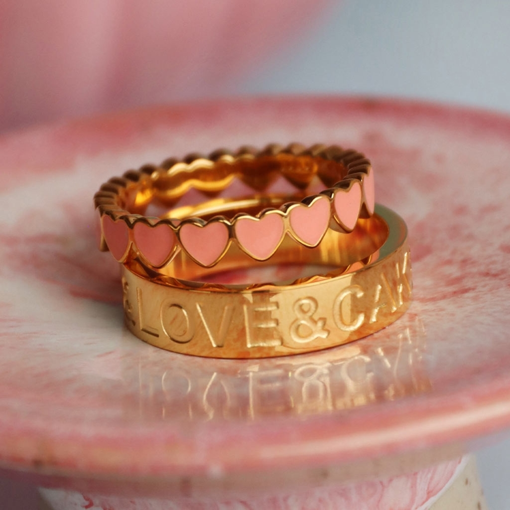 
                  
                    Burnt Coral Connected Hearts Ring
                  
                