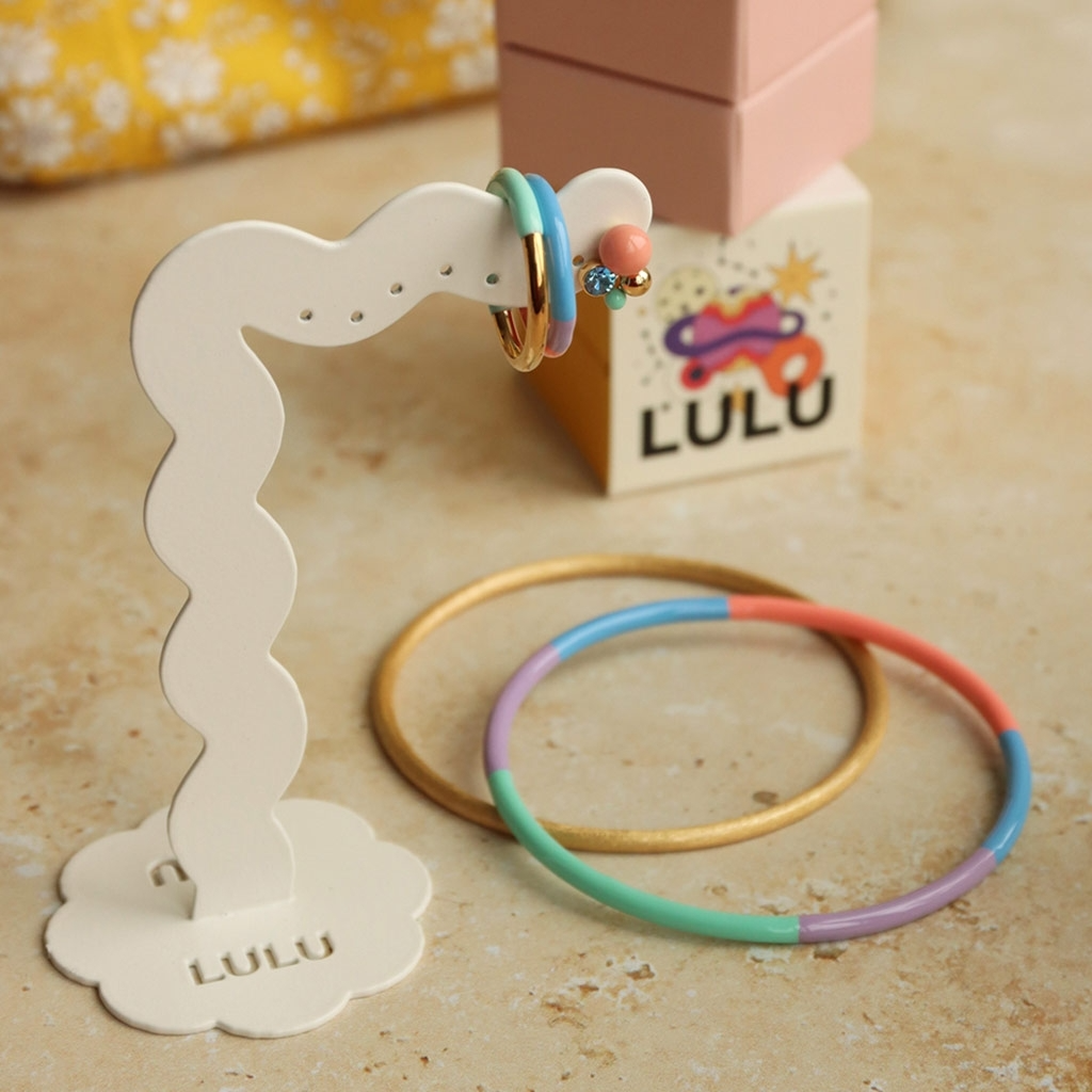 
                  
                    Rainbow Color Quatro Bangle
                  
                