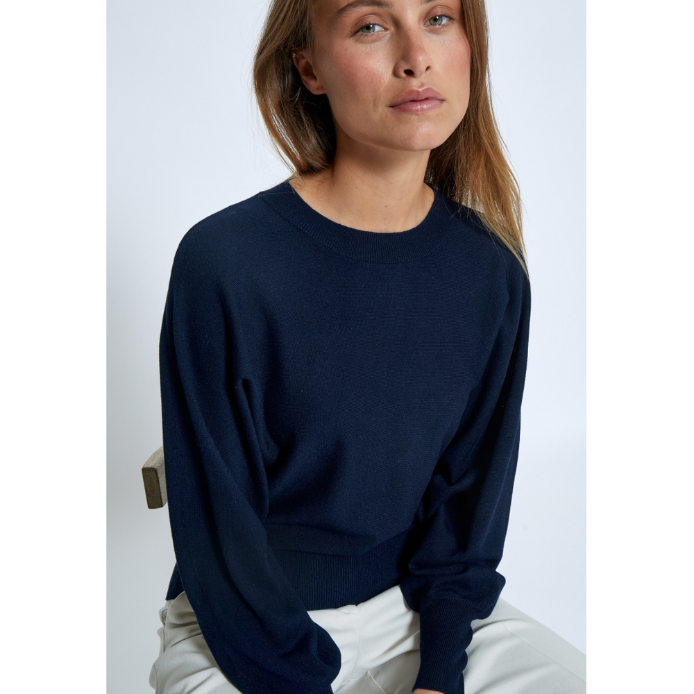 
                  
                    MSDANA – Schwarzer Strickpullover mit Iris-Print und Fledermausärmeln
                  
                