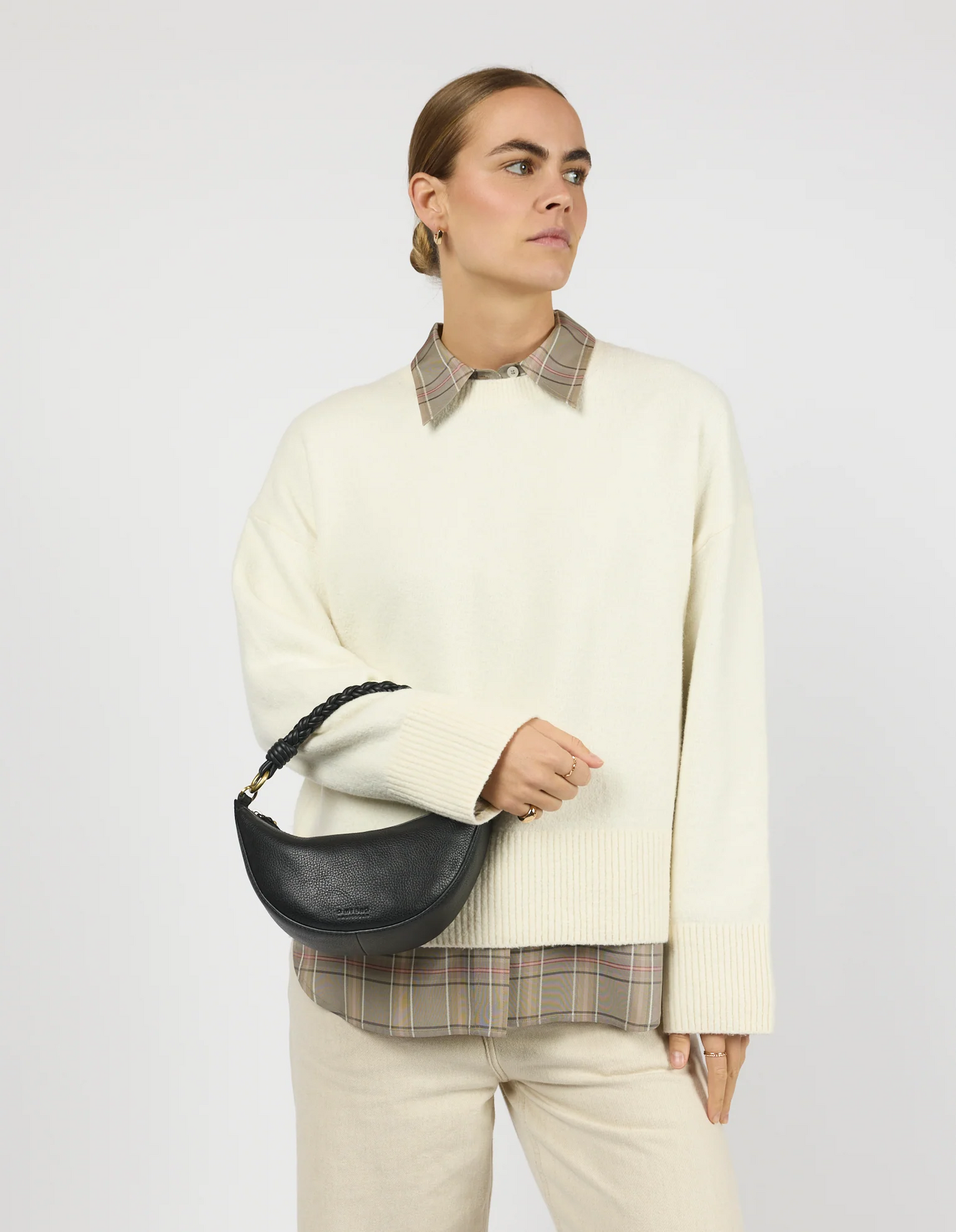 
                  
                    LEO Black Soft Grain Leather Twisted Handle Mini Bag
                  
                