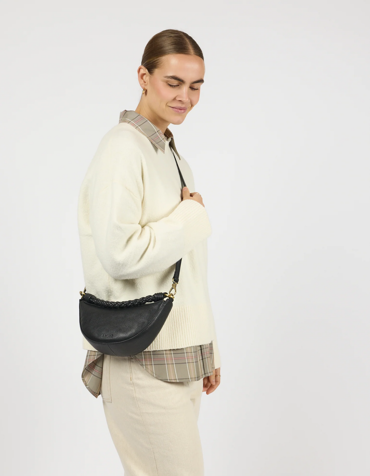 
                  
                    LEO Black Soft Grain Leather Twisted Handle Mini Bag
                  
                