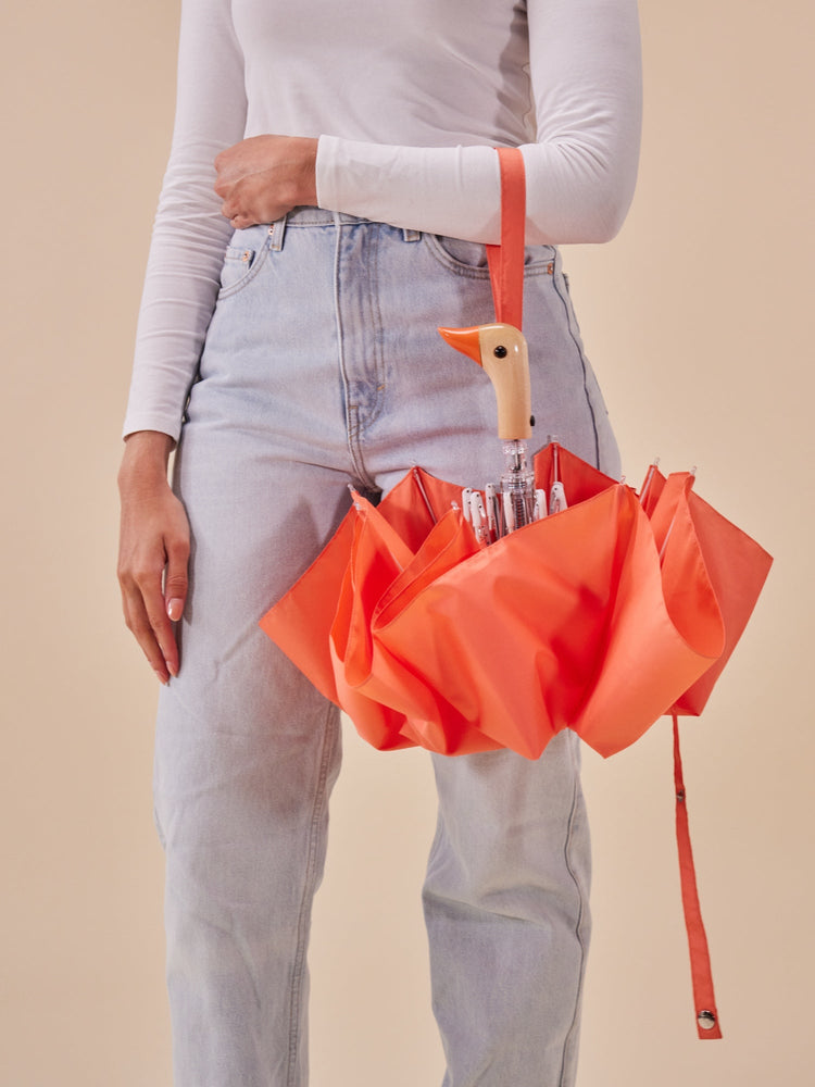 
                  
                    Peach Compact Eco-Friendly Wind Resistant Umbrella
                  
                