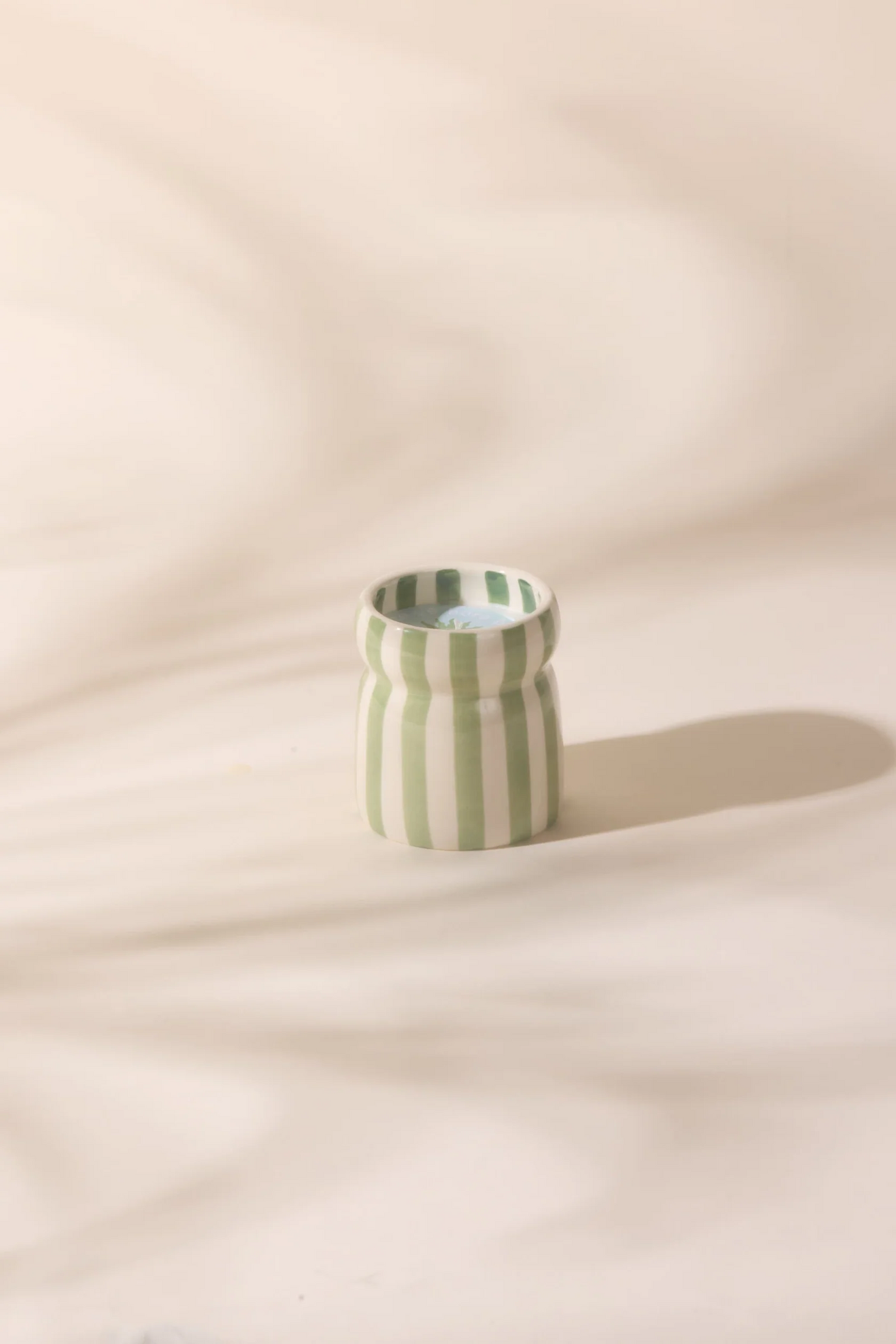 
                  
                    CABANA Sage Bora Bora Striped Ceramic Candle
                  
                