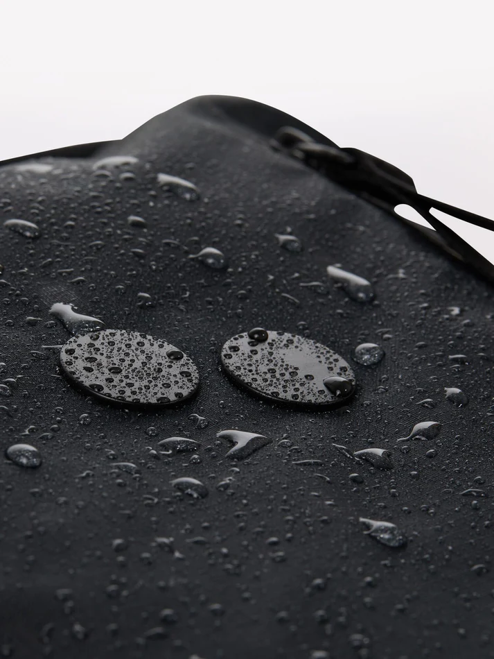 
                  
                    KOMUT Pure Black Backpack
                  
                