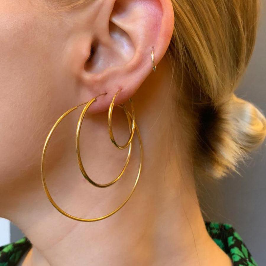 
                  
                    Gold Plated Hoop Earrings
                  
                