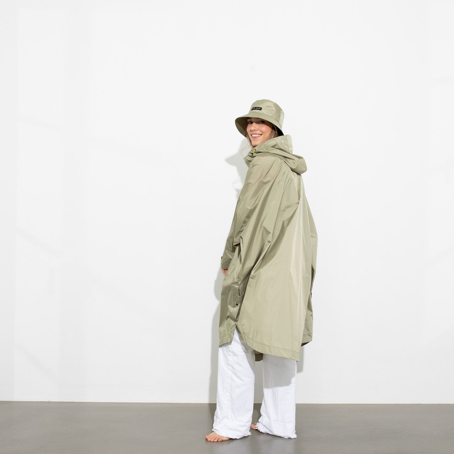 
                  
                    Pale Olive Solid Raincoat
                  
                
