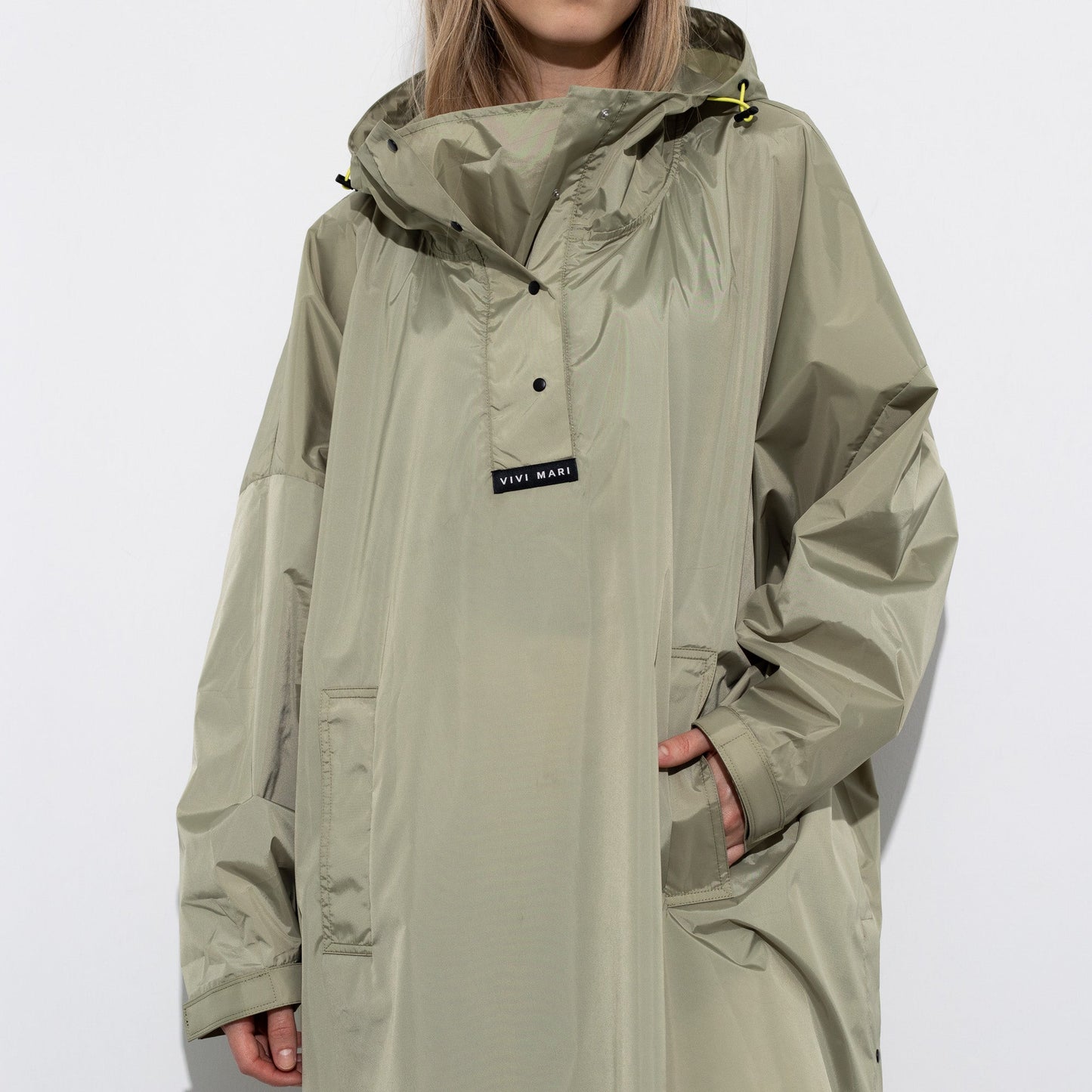 
                  
                    Pale Olive Solid Raincoat
                  
                