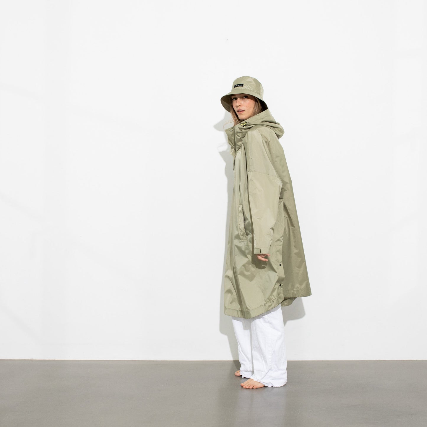 
                  
                    Pale Olive Solid Raincoat
                  
                