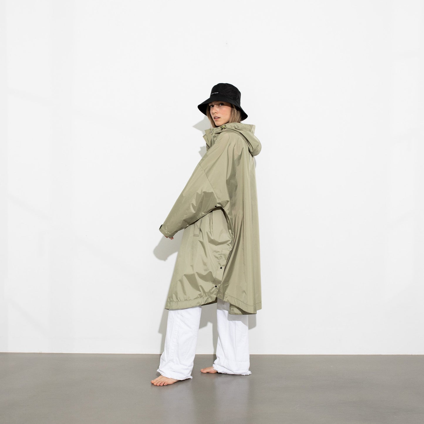 
                  
                    Pale Olive Solid Raincoat
                  
                