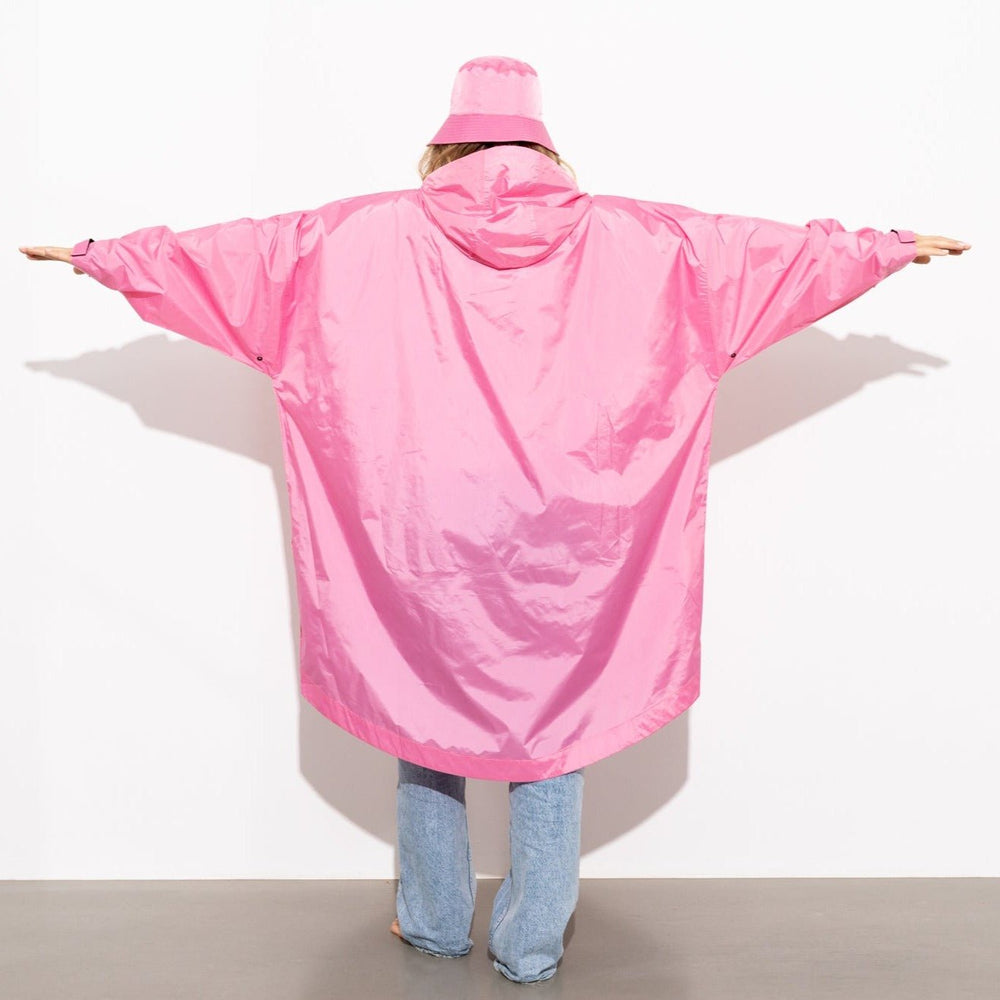 
                  
                    Weicher, einfarbiger Regenmantel in Rosa
                  
                
