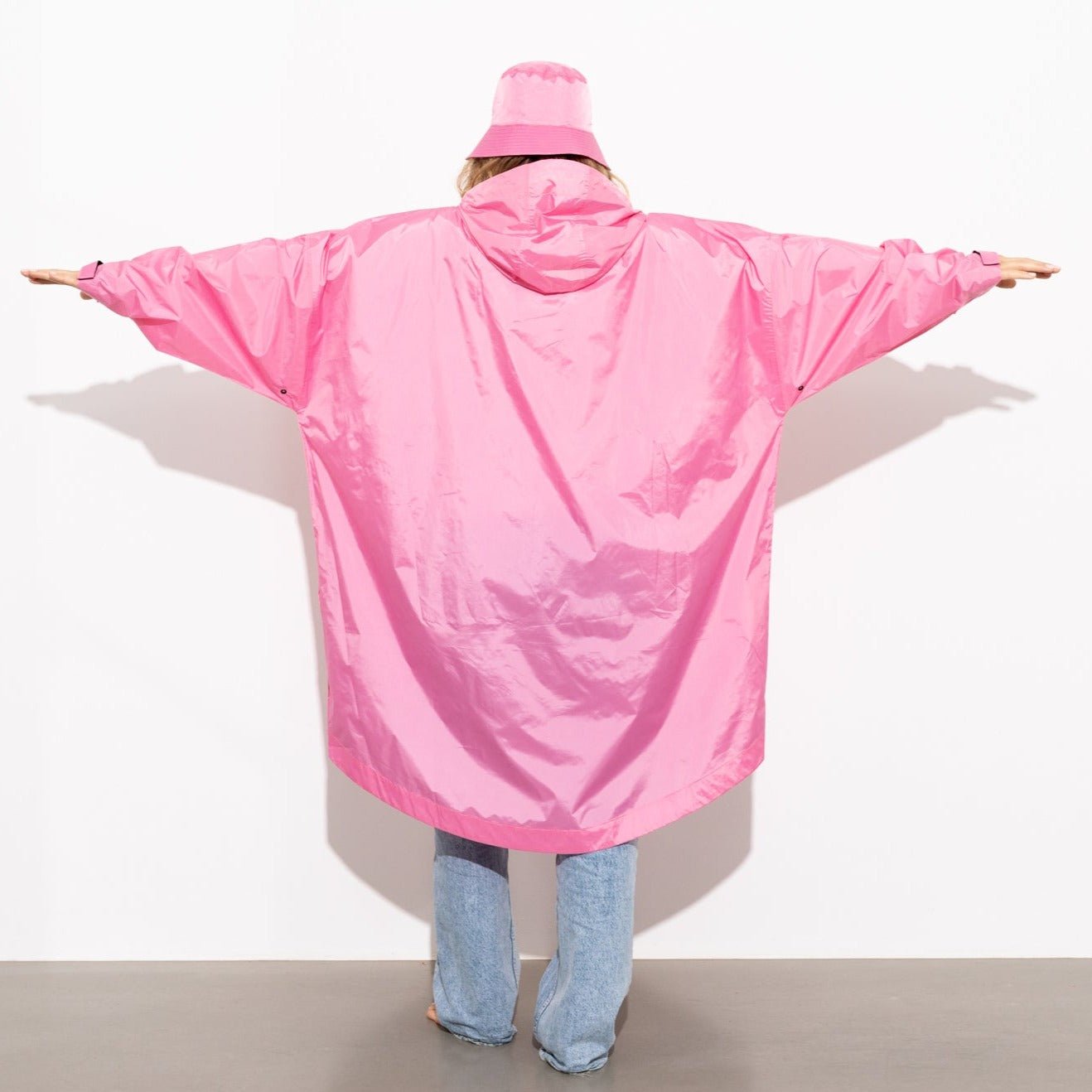 
                  
                    Weicher, einfarbiger Regenmantel in Rosa
                  
                