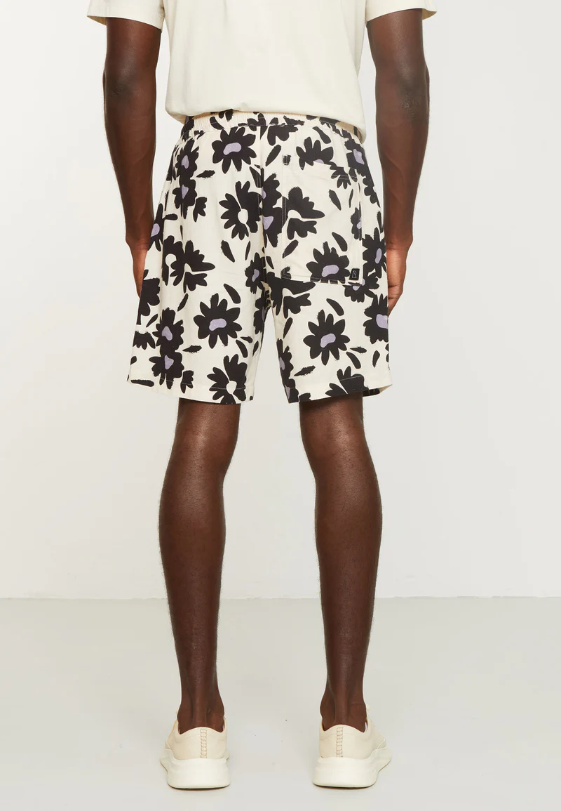 
                  
                    CURRY BLOOM White Linen Shorts
                  
                