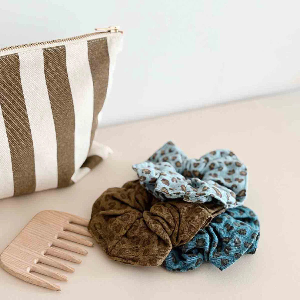 
                  
                    Blue Jean Mini Leoprad Scrunchie
                  
                