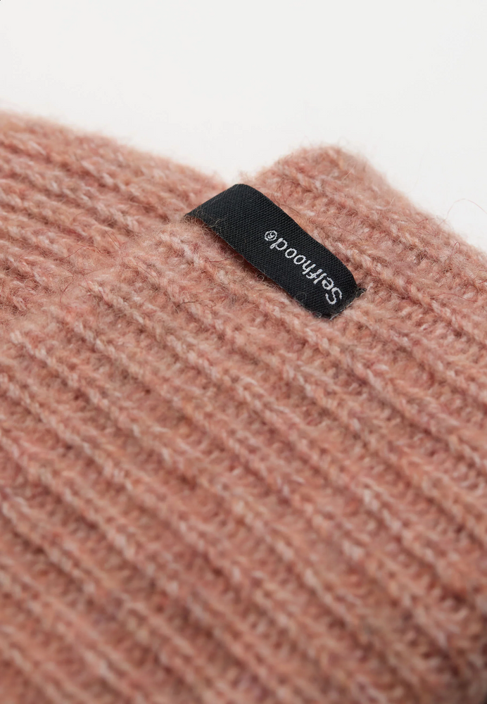 
                  
                    Amber Fluffy Beanie
                  
                