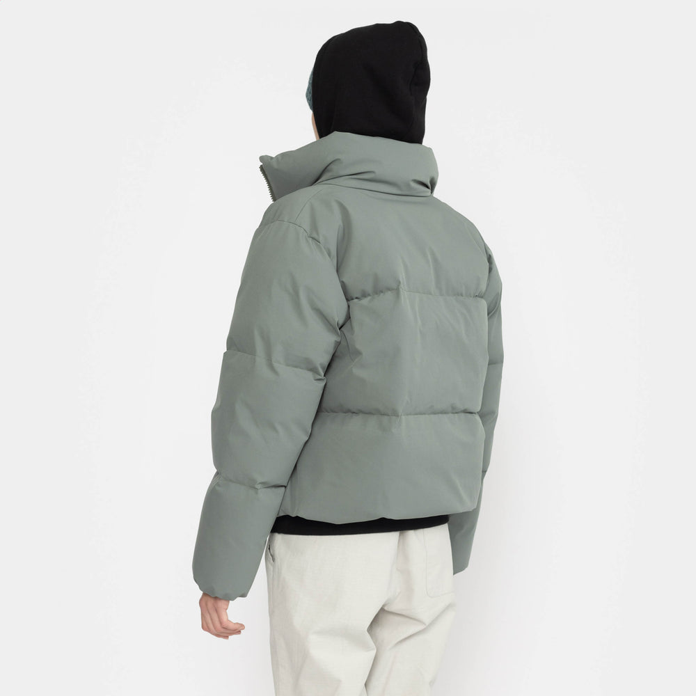 
                  
                    Kurze Steppjacke in Dust Petrol
                  
                