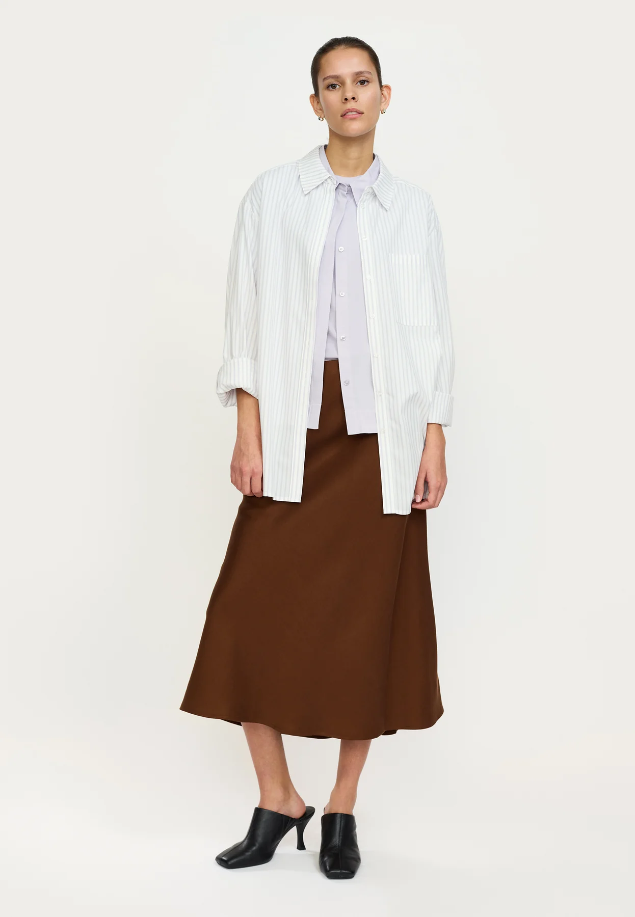 
                  
                    SRUMA ABIA Downtown Brauner Midirock
                  
                