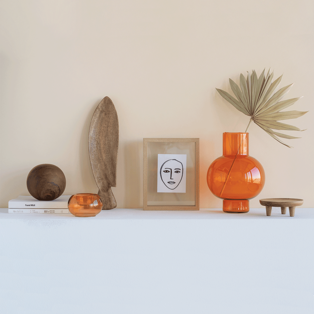 
                  
                    TUMMY Eine Vase aus orangefarbenem Rostglas
                  
                
