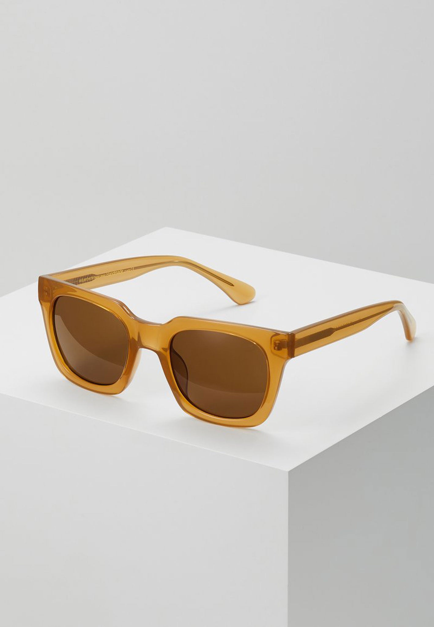 
                  
                    NANCY Light Brown Transparent Sunglasses
                  
                