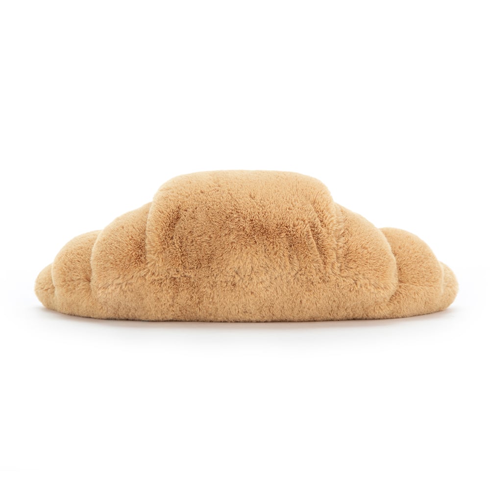 
                  
                    Lustiges kleines Kuscheltier mit Croissant
                  
                