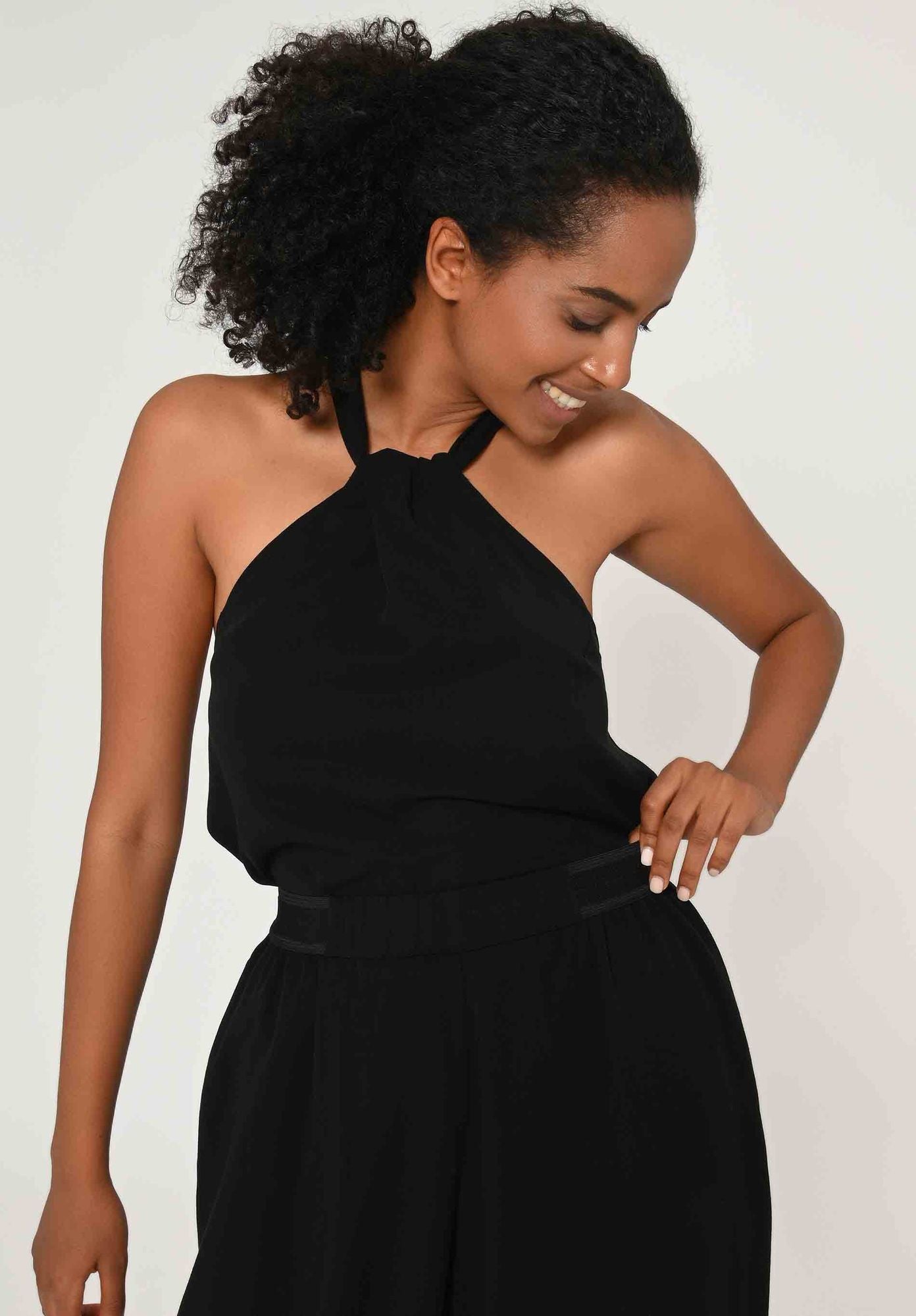 
                  
                    TAVIRA Schwarze Tencel-Hose 
                  
                