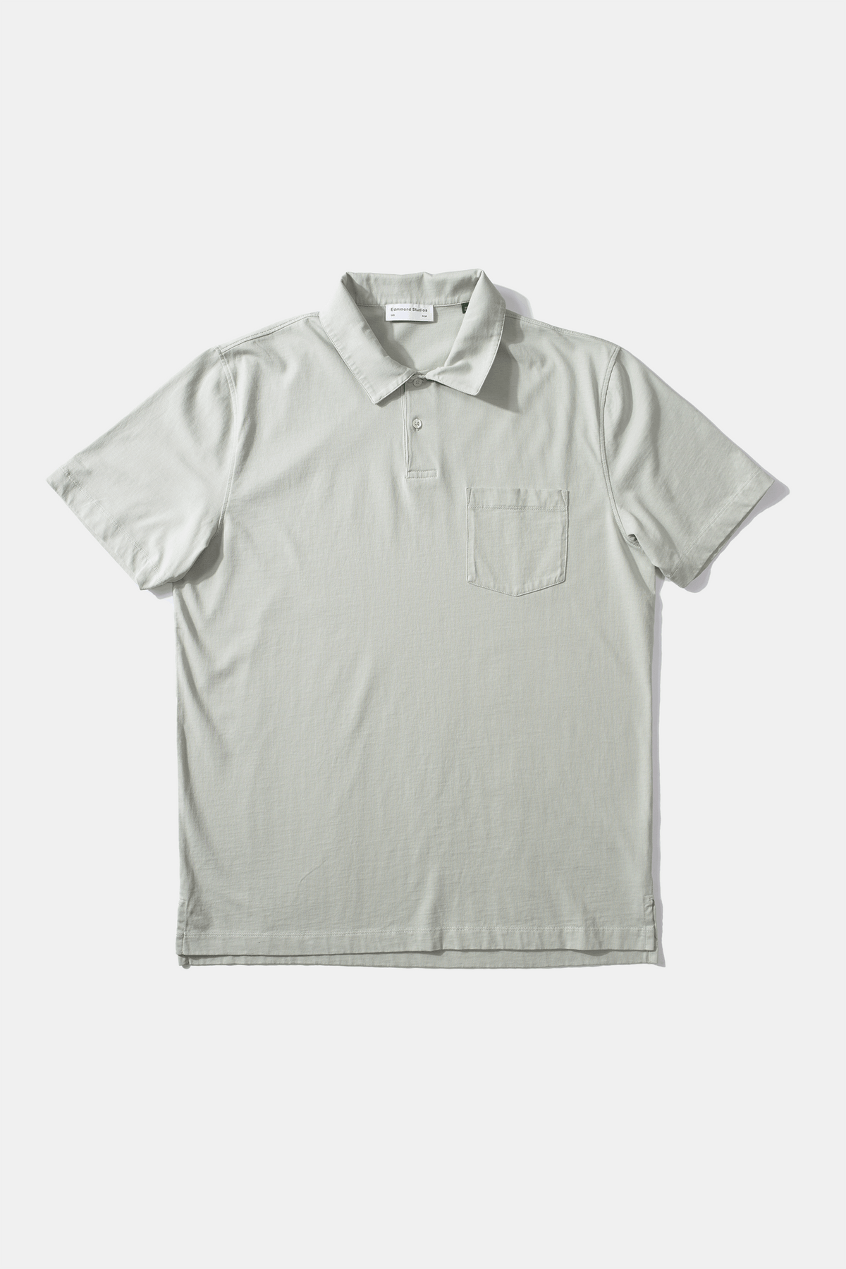 
                  
                    Schlichtes Polo-T-Shirt aus salbeifarbenem Jersey
                  
                