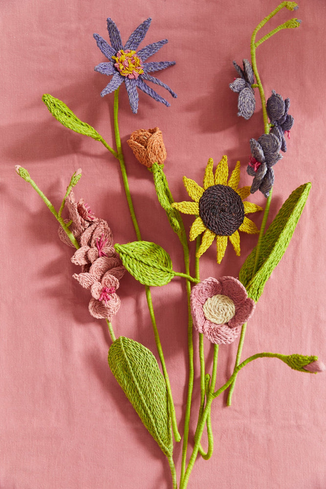 
                  
                    Rosenbastblume
                  
                