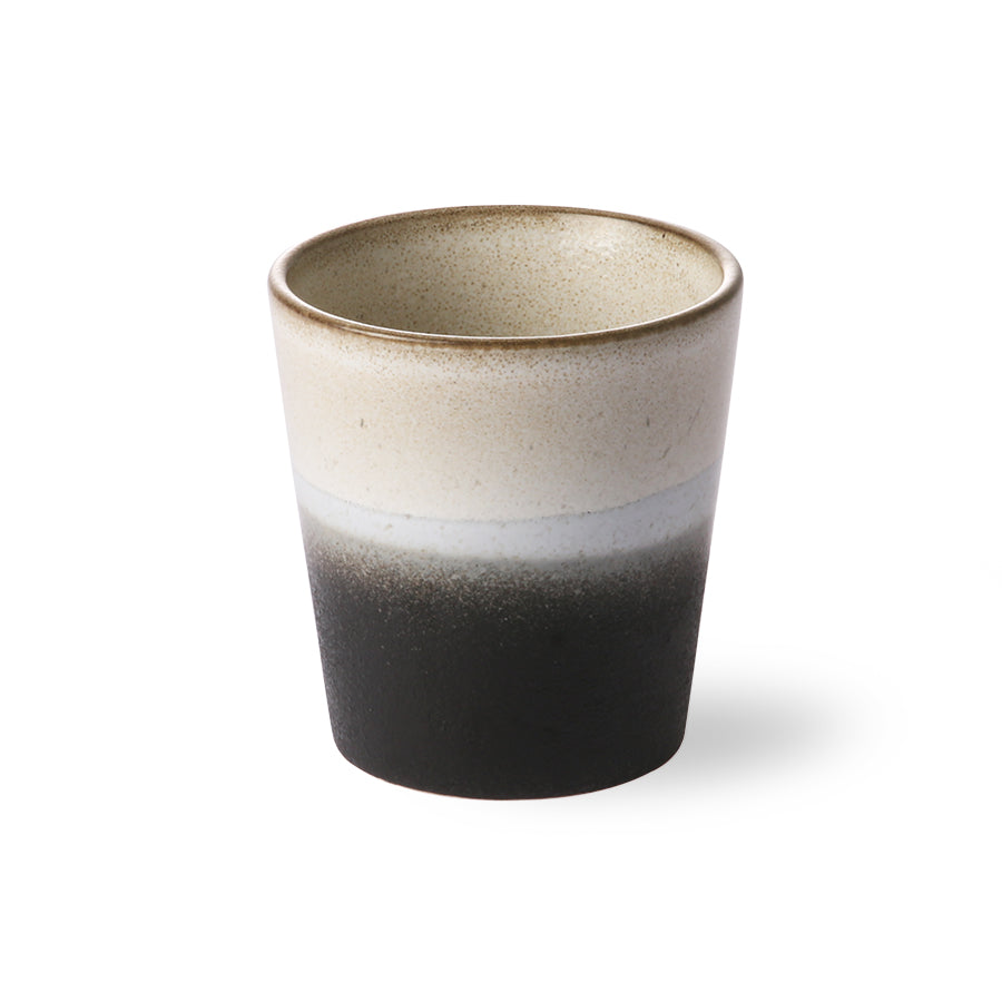 
                  
                    70s ceramics: coffee mug, rock
                  
                