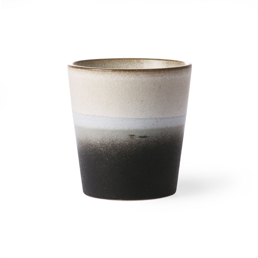 
                  
                    70s ceramics: coffee mug, rock
                  
                