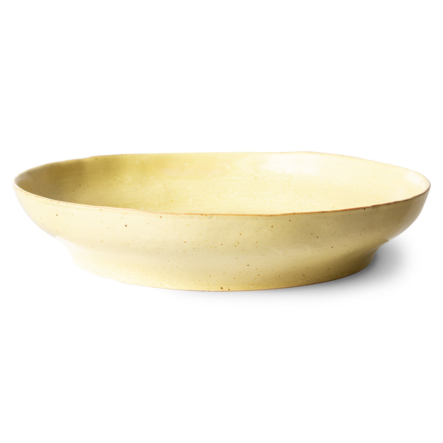 
                  
                    BOLD &amp; BASIC Pastateller aus gelber und brauner Keramik
                  
                